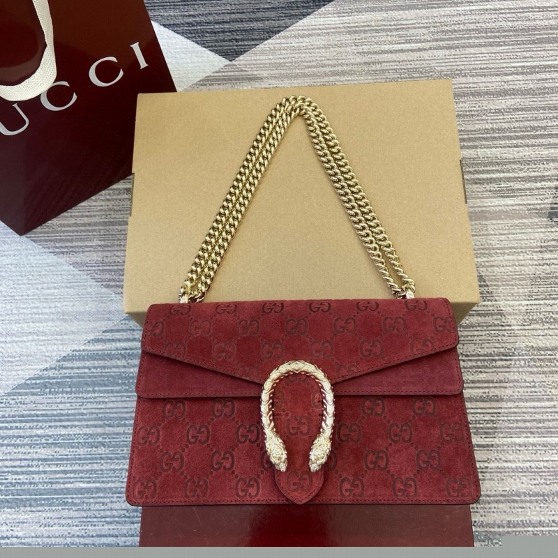 G*u*i top handle bags